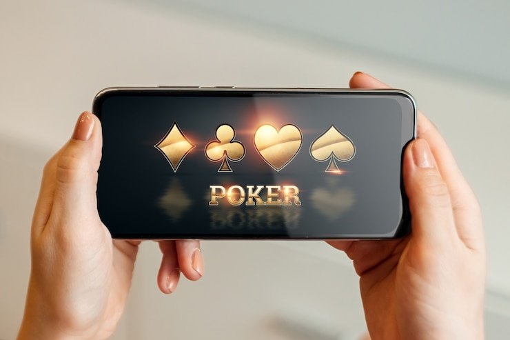 Live Casino Hold'em table on mobile Casino Hold'em live dealer table with community cards displayed